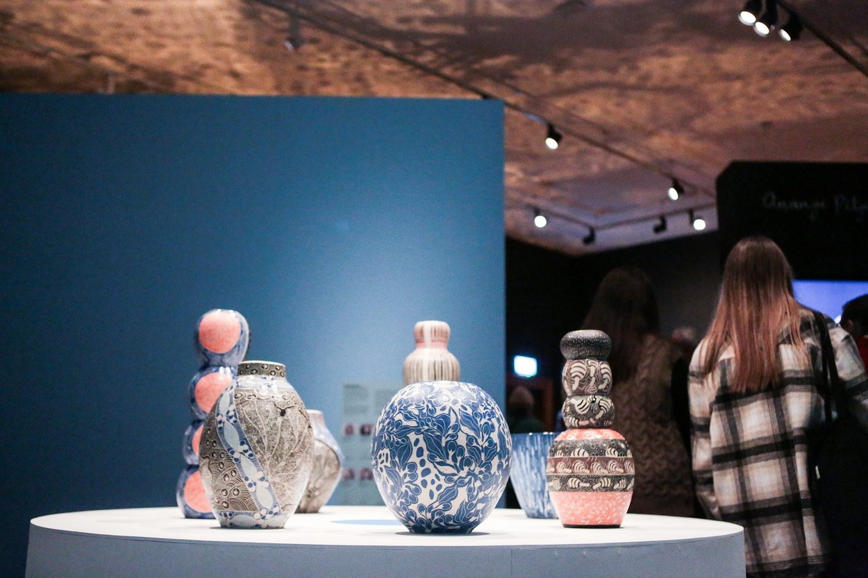 A group of ceramics on display in an exhibition