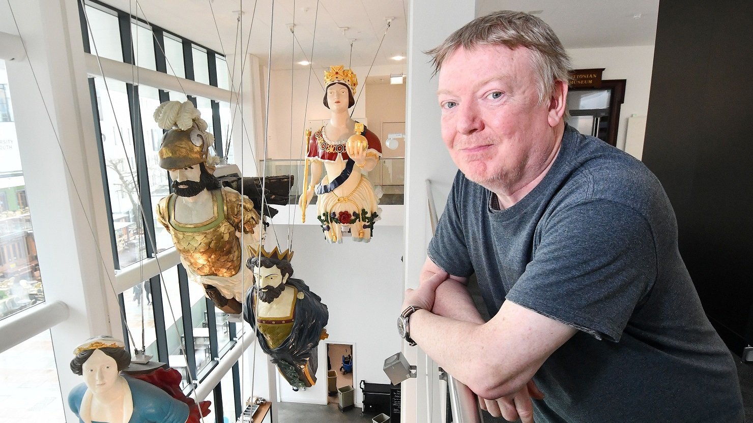 Artist Paul Rooney stands in the Active Archives gallery at The Box Plymouth