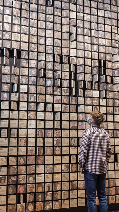 A visitor looking at the Mayflower 400: Legend and Legacy exhibition at The Box