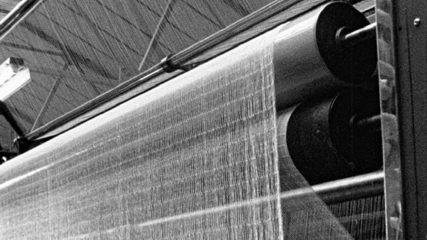 A black and white image of a textile loom