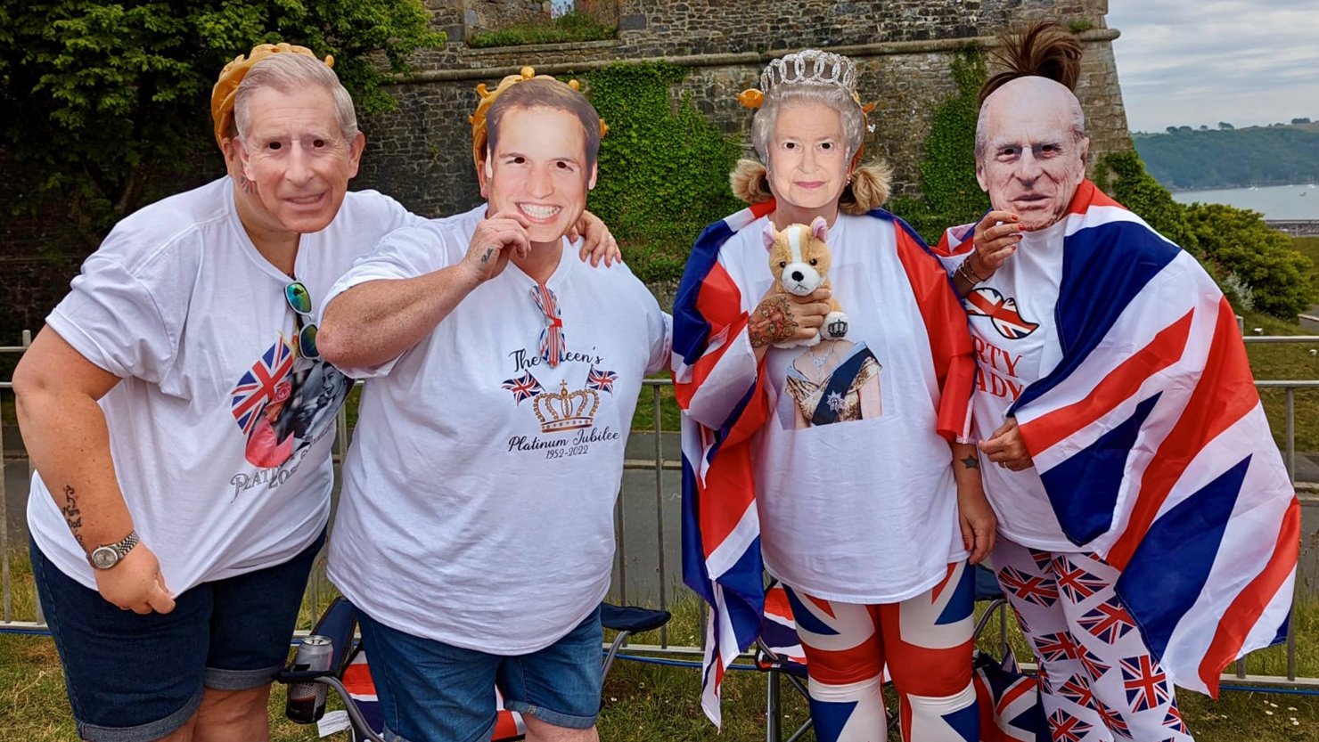 Four people wearing Jubilee face masks