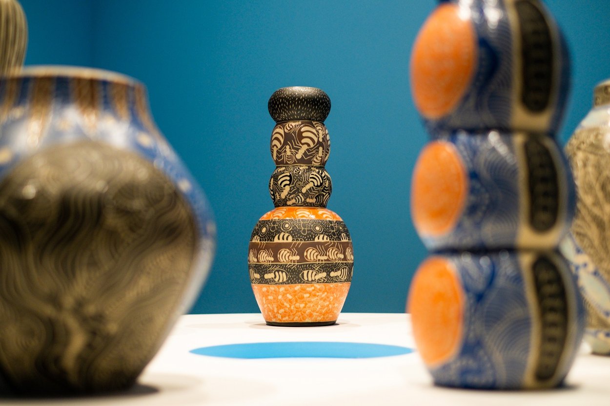 A group of ceramics on display in an exhibition