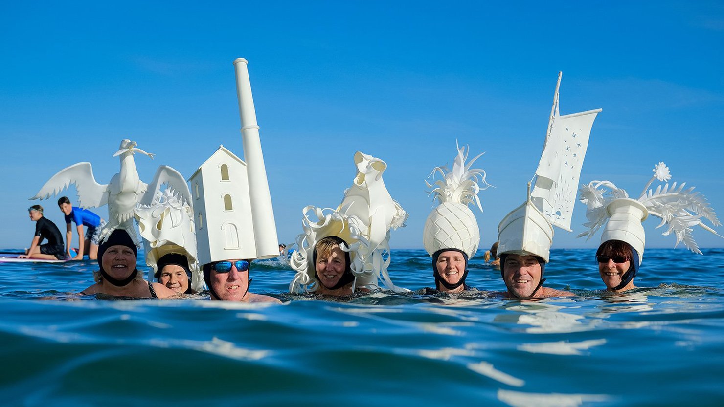 Members of the Gorran Haven Cold Water Crew in their amazing swimming hats. Image courtesy of Greg Martin / Cornwall Live.
