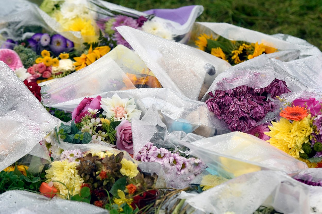 A pile of flowers left in tribute to the victims of the Keyham shootings