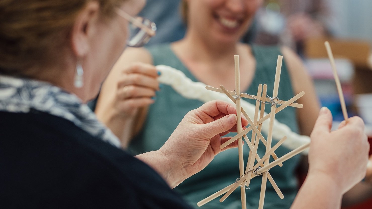 A school pupil takes part in a creative workshop activity