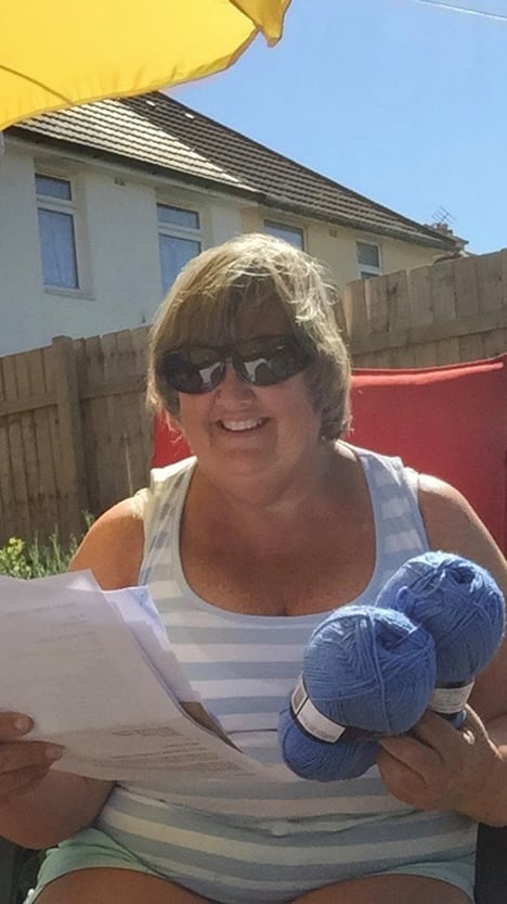 A member of The Box's Traditional Craft Group with her wool