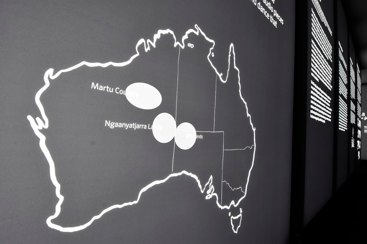 Map of Australia in white on a grey background