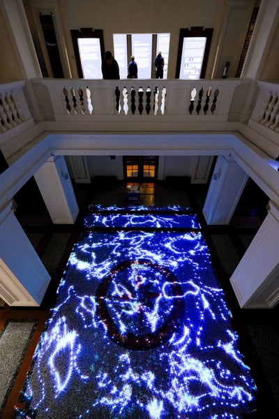 'Walking through a Songline' projection at The Box viewed from the atrium
