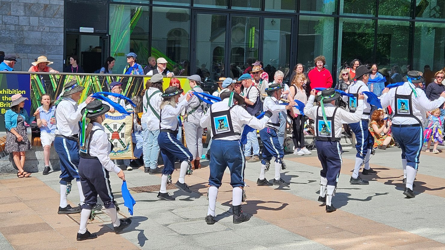 Visitors to The Box Plymouth standing in front of Portrait of Mai (Omai) by Sir Joshua Reynolds.