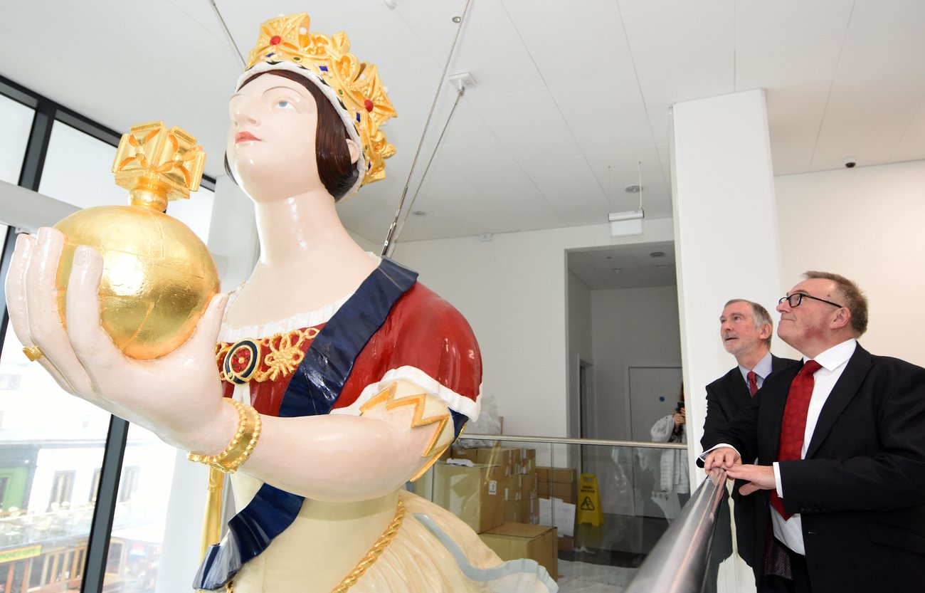 Councillors Tudor Evans and Ian Bowyer with the Windsor Castle figurehead