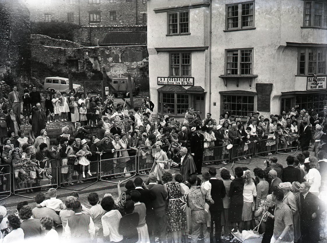 The Queen, accompanied by Prince Philip, on a walkabout in Plymouth's Barbican in July 1962 (Mirrorpix)