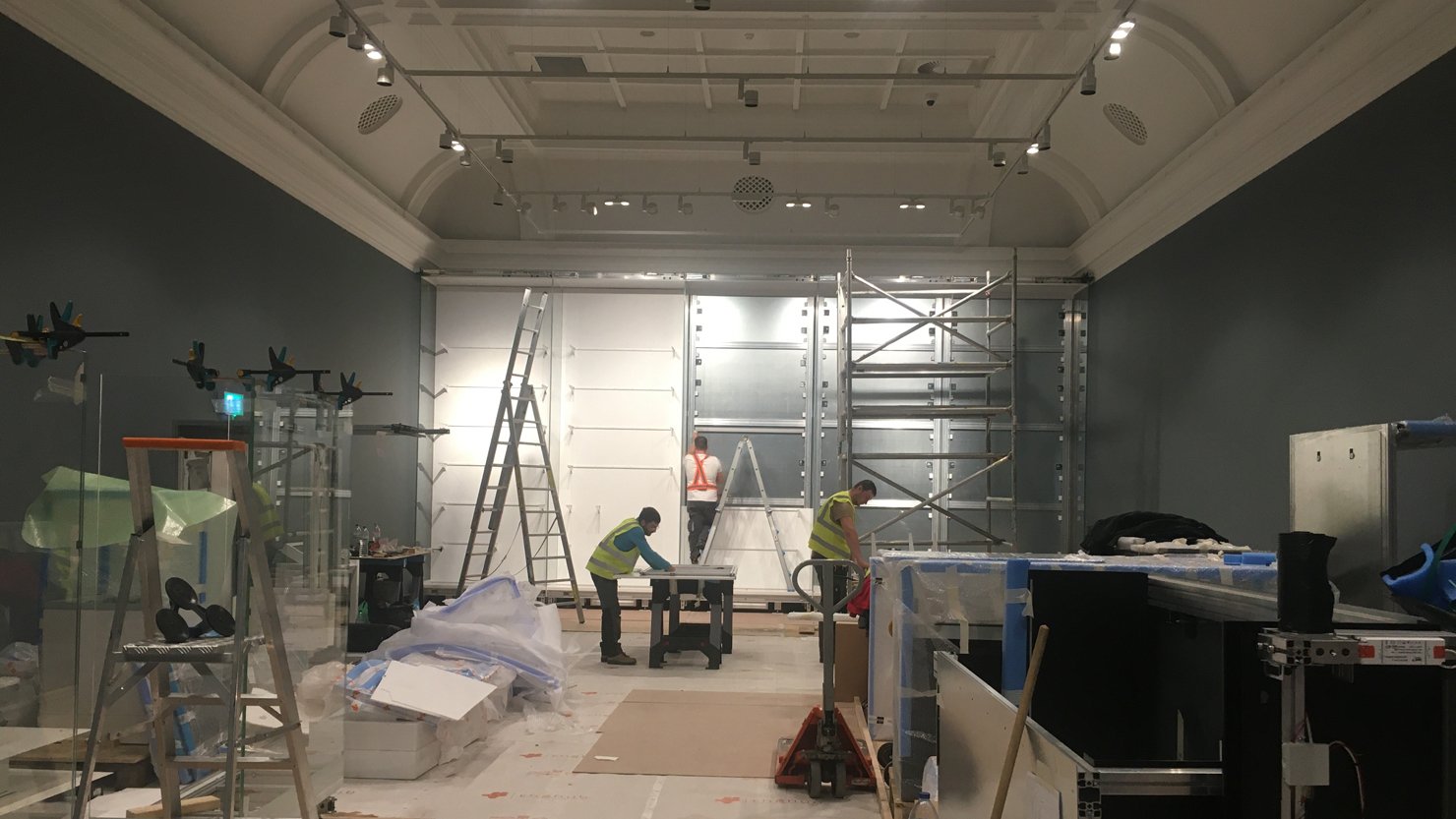 Workmen prepping a gallery for building work