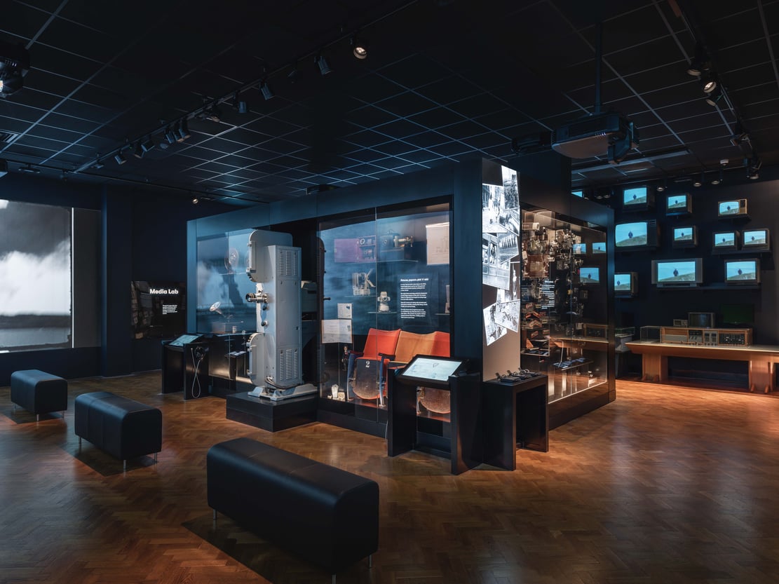 Media Lab gallery with display case and audio visual installations