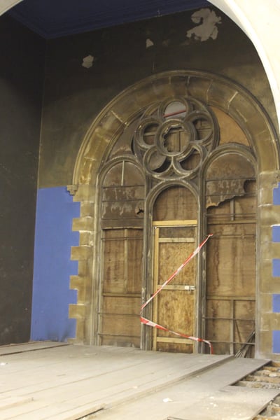Boarded up window in St Luke's church, Plymouth