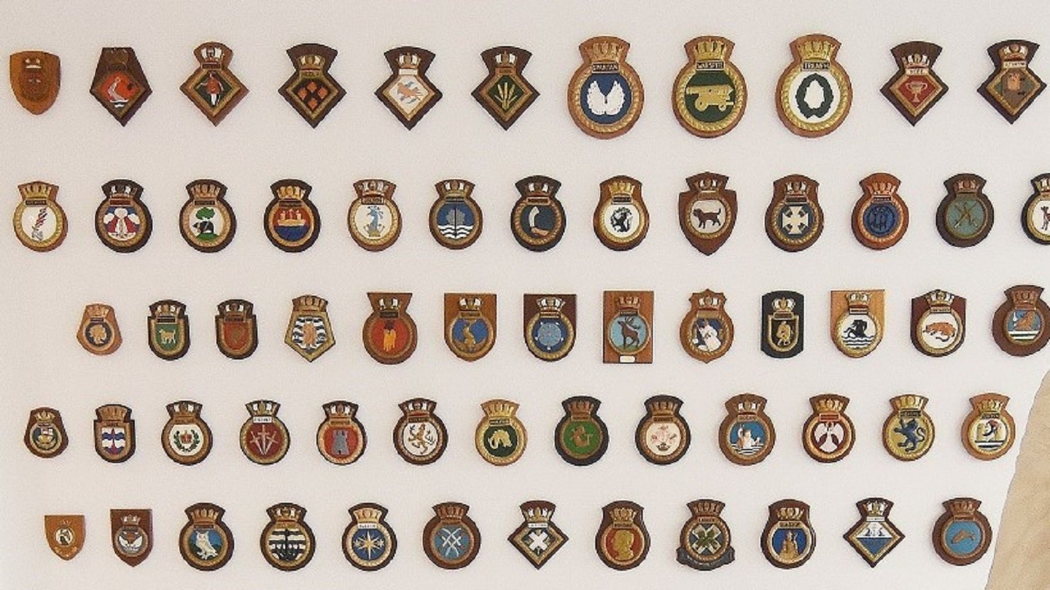 Ships' badges on display at The Box