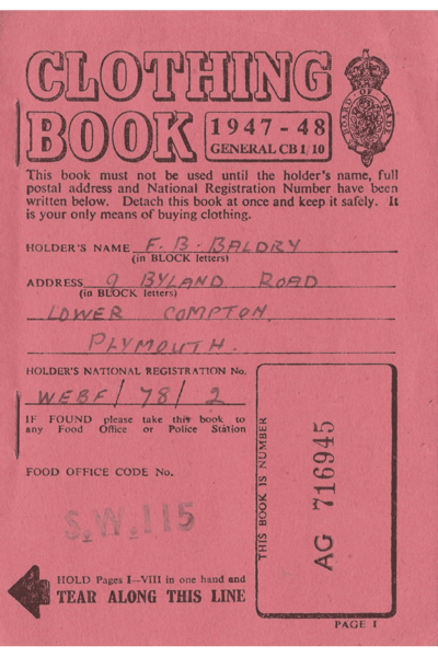 Photograph of a red Clothing Book 1947-1948 which was a means of buying clothing at this time