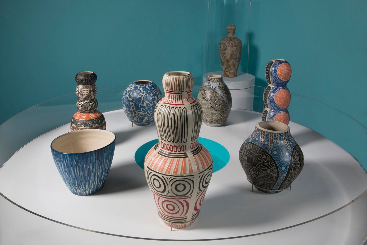 A group of ceramics on display in an exhibition