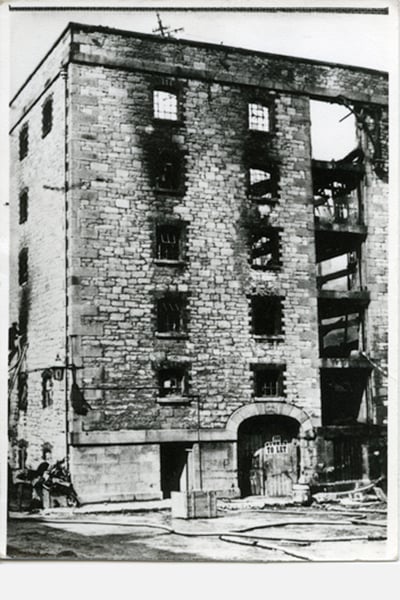 An early 1900s image showing the shell of the Old Sugar Refinery, Mill Street
