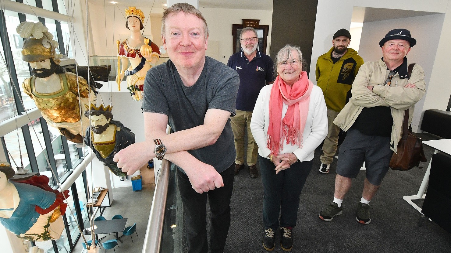 Artist Paul Rooney (left) and members of The Box's veterans group