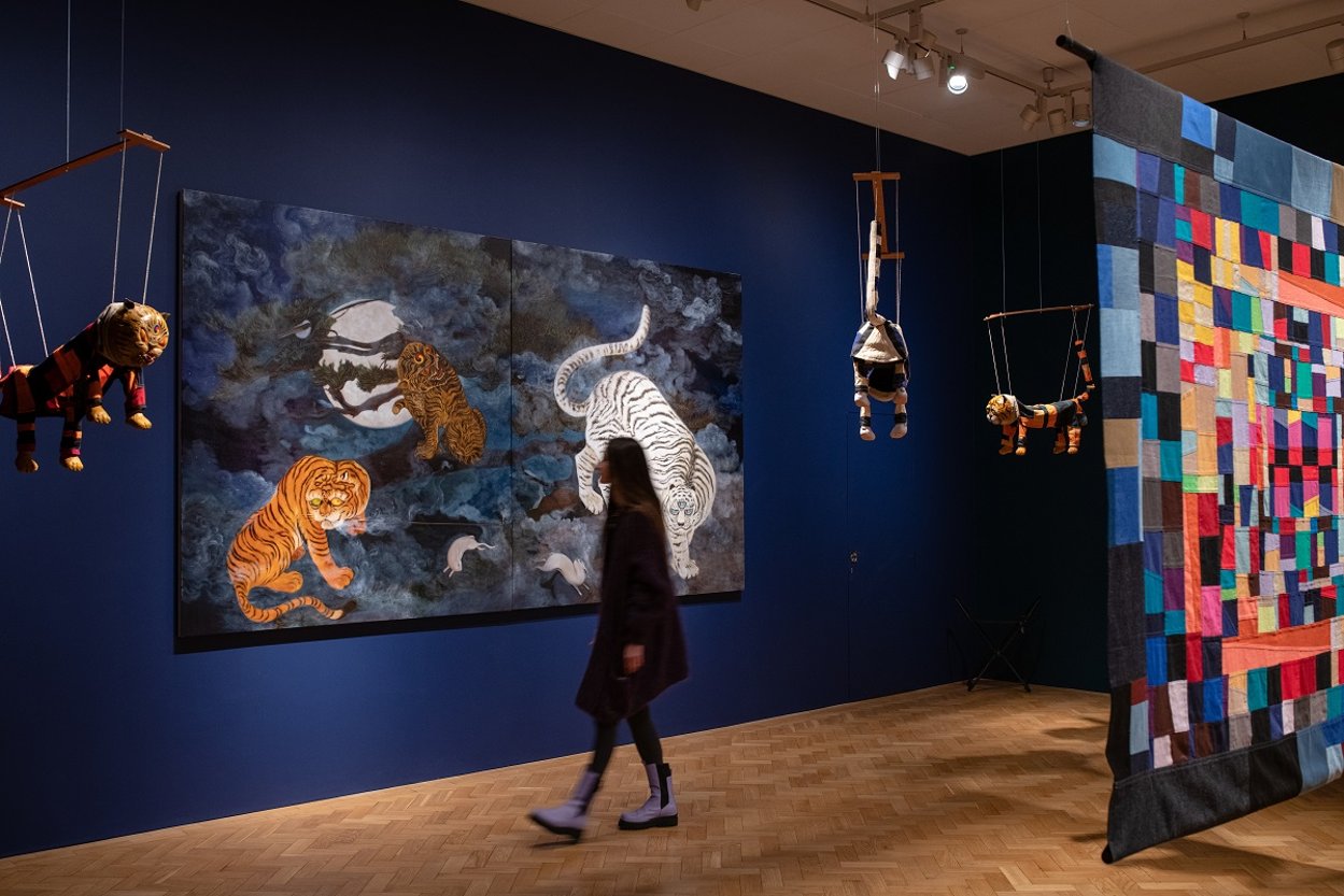 Visitor looking at Zadie Xa exhibition