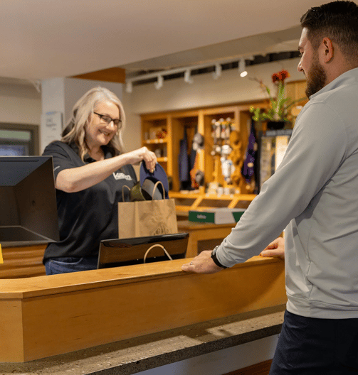 image of chef supplies employee bagging a product for a customer