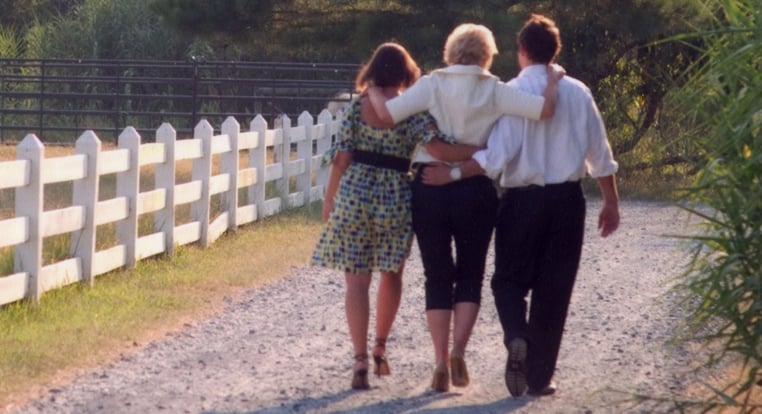 Picture of Bible family walking down gravel drive