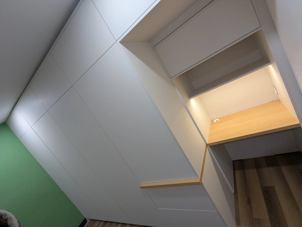 custom built-in wardrobe with makeup corner and wood handle