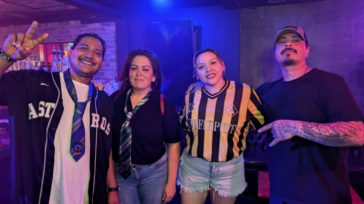 Astros-Wizards jersey, Hufflepuff Quidditch shirt and Slytherin tie unite a Wizards Night Out crew of four