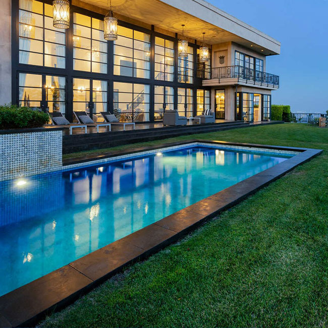 A picture of bluestone pavers around a pool in Melbourne.