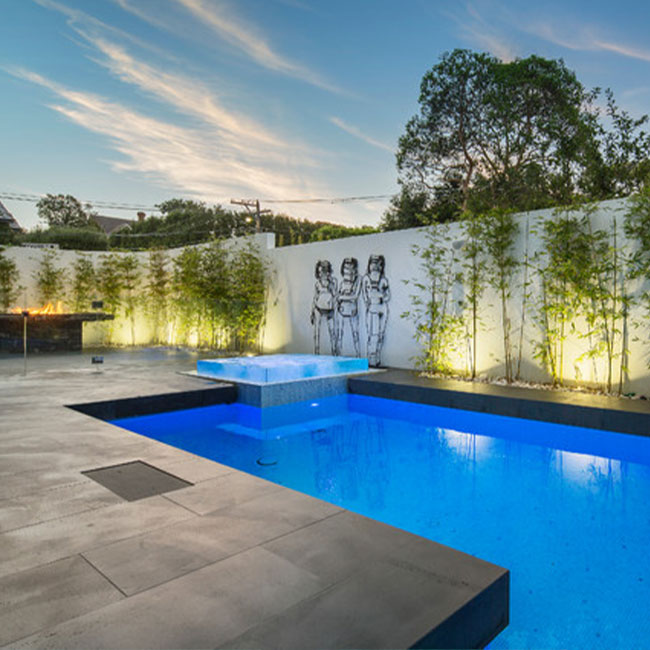A picture of bluestone pavers around a pool in Melbourne.