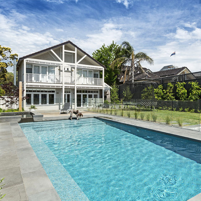 A picture of bluestone pavers around a pool in Melbourne.