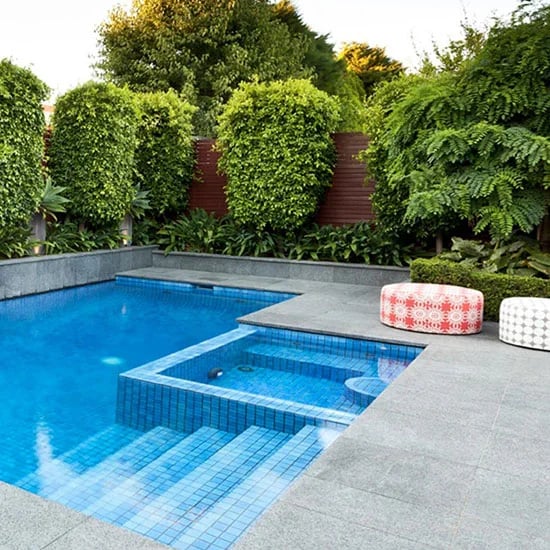 picture of granite pavers around a pool in Melbourne.