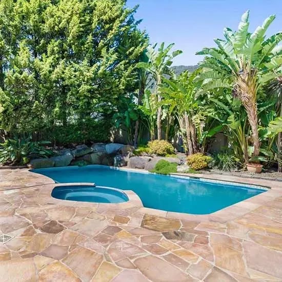 A picture of crazy paving around a pool in Melbourne.