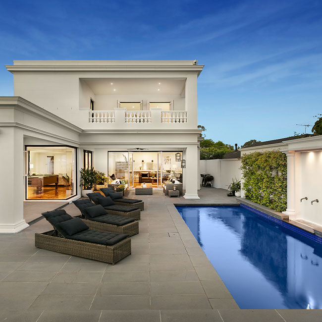 A picture of bluestone pavers around a pool in Melbourne.
