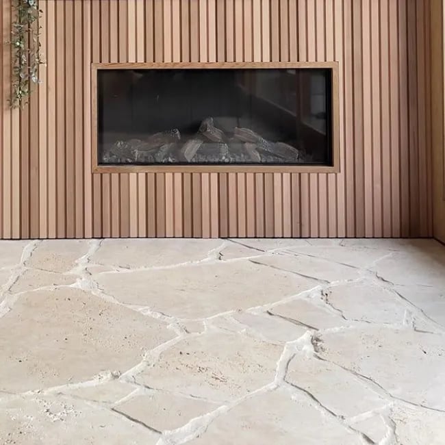 A picture of travertine crazy paving around a pool in Melbourne.