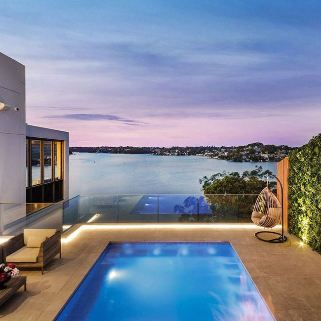 A picture of bluestone pavers around a pool in Melbourne.
