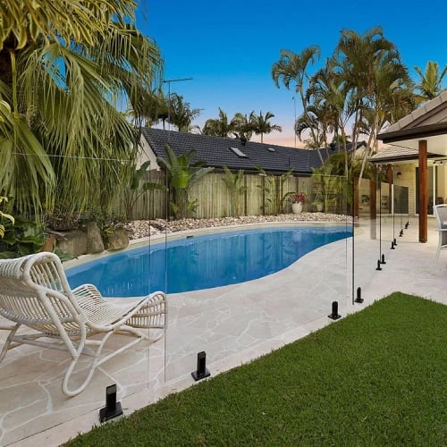 linen travertine crazy paving around pool