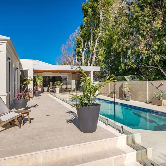 A picture of travertine tiles around a pool in Sydney