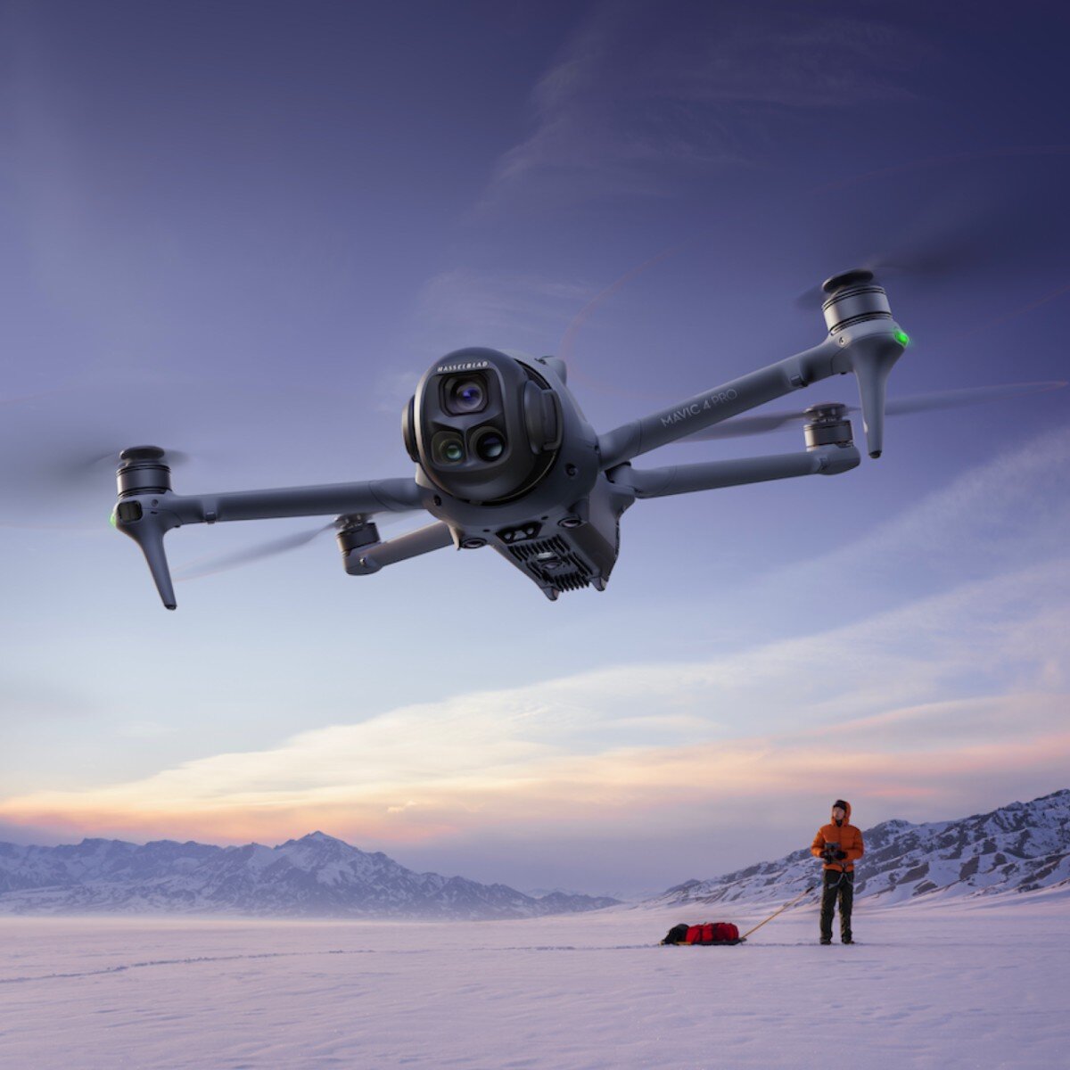 DJI Mavic 4 Pro in flight over a snowy landscape