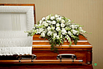 All White Casket Spray by Grohe Florists