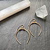 Gold crescent hoop earrings