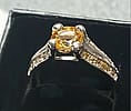 Silver moissanite ring with citrine center stone