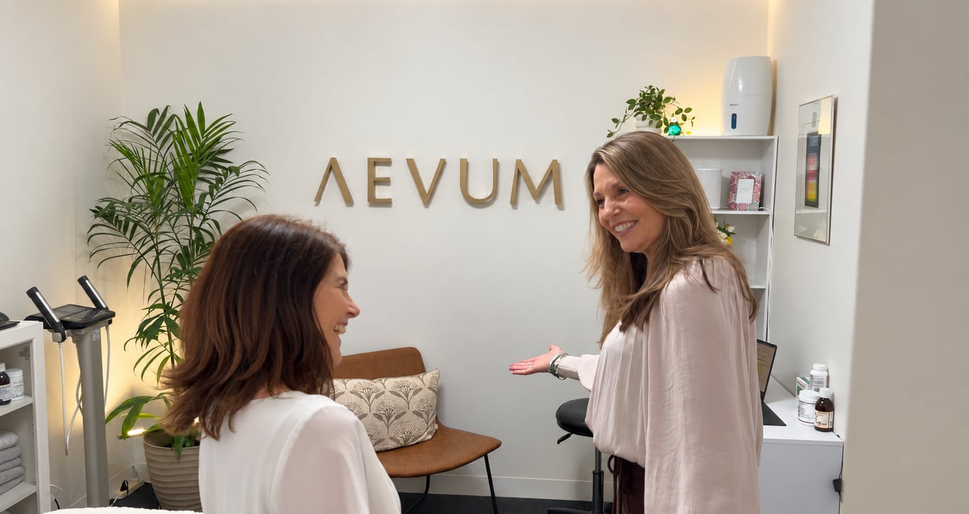 Dr Kiaanna speaking with a client in the Aevum clinic
