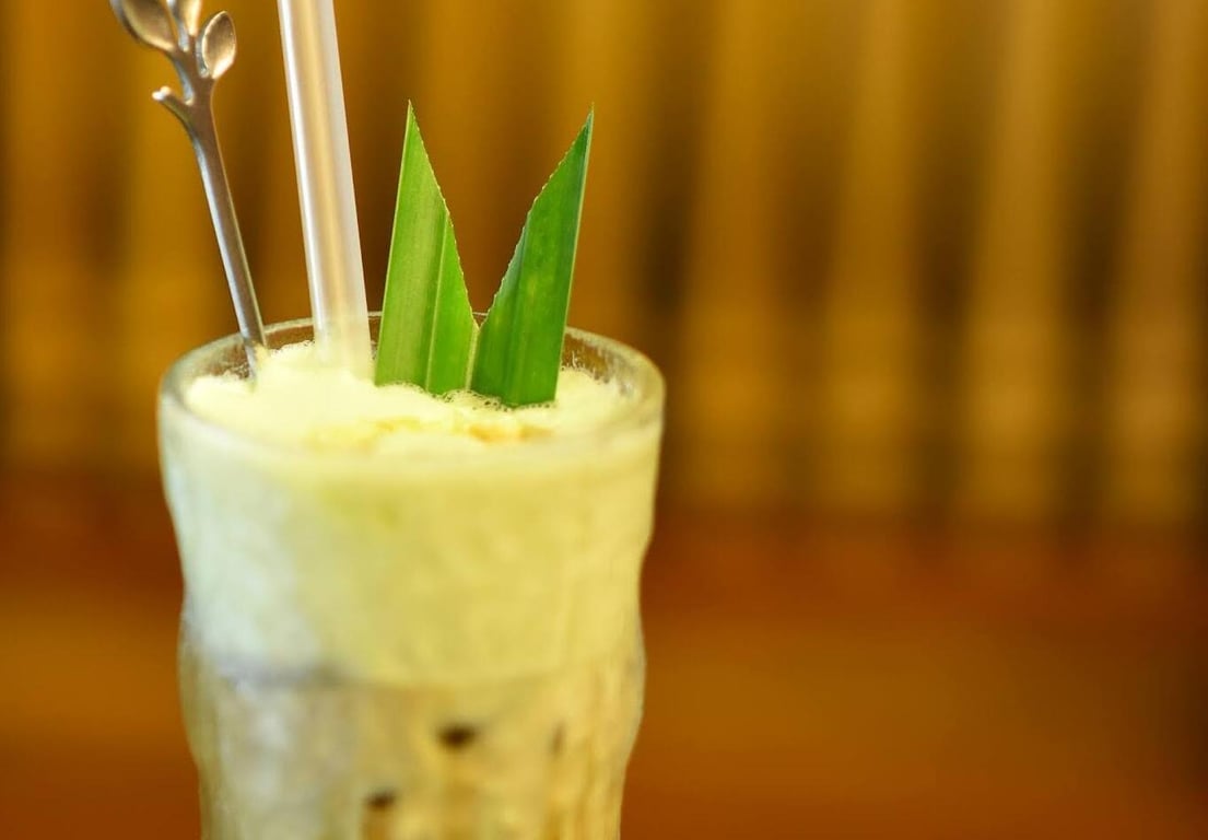 Vibrant green pandan leaves used in a modern latte, taking its place as the new matcha