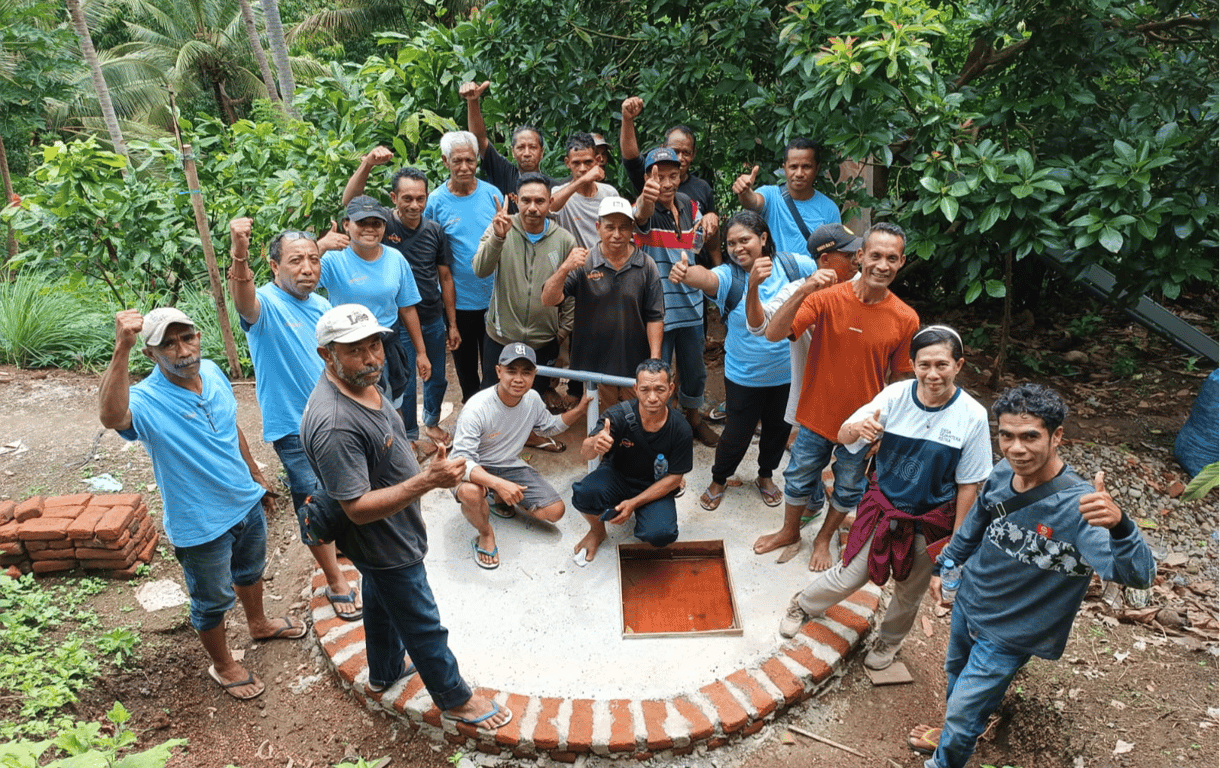 Building climate resilience through water tank installations in farming communities.