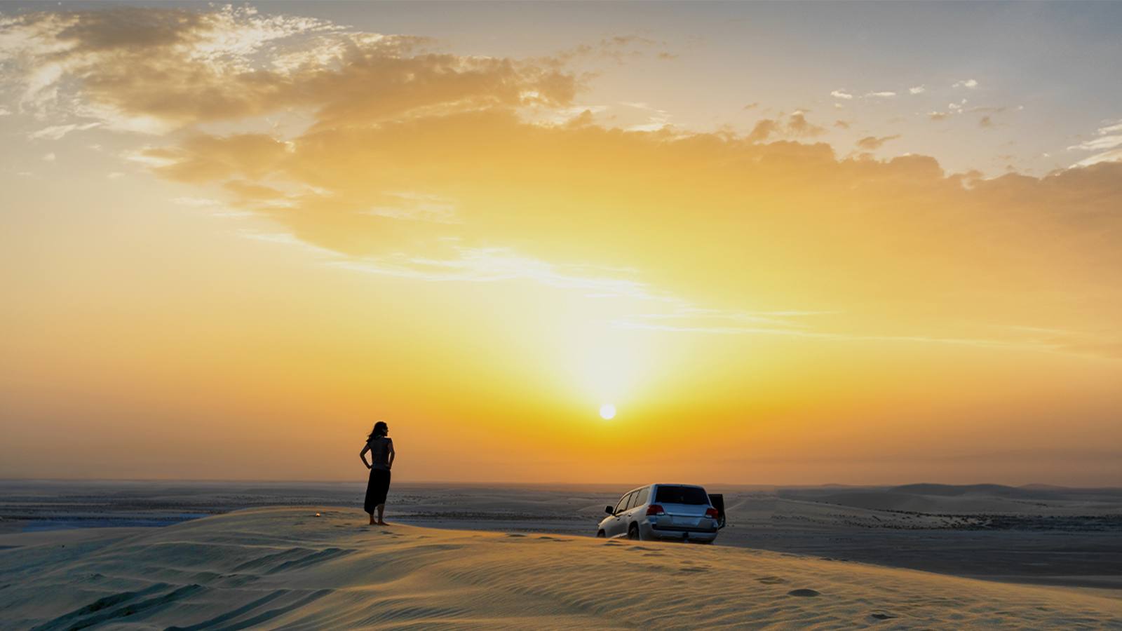 Doha: Sunset Desert Safari with Camel Ride and Sandboarding