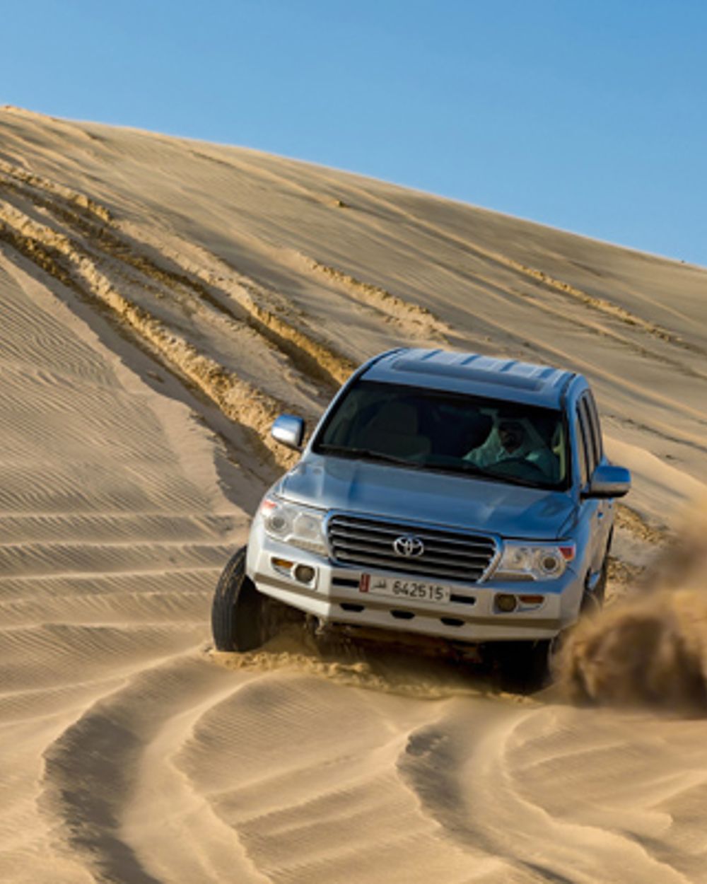 Doha: Sunset Desert Safari with Camel Ride and Sandboarding