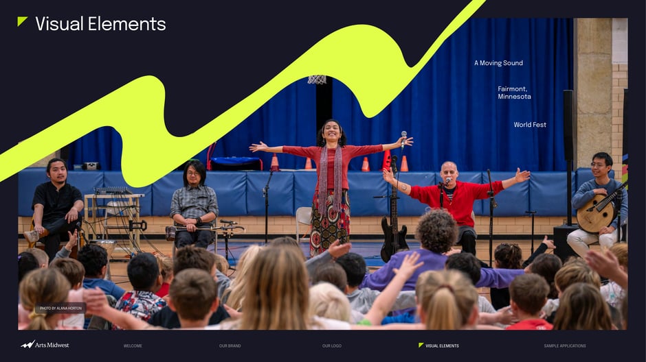Example photography demonstrates the brand's upward 'accent' graphic over community
