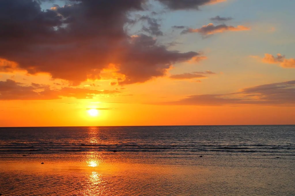 Sunset over the sea on the Bali coast