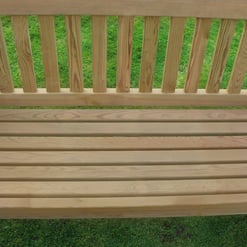 Natural cedar outdoor garden bench with slatted seat and backrest, perfect for relaxing in your backyard or patio. Crafted for durability and style, ideal for garden seating.